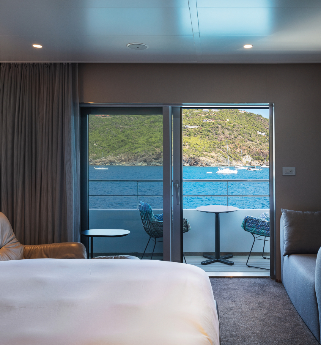 Emerald Cruises yacht cabin overlooking caribbean sea setting