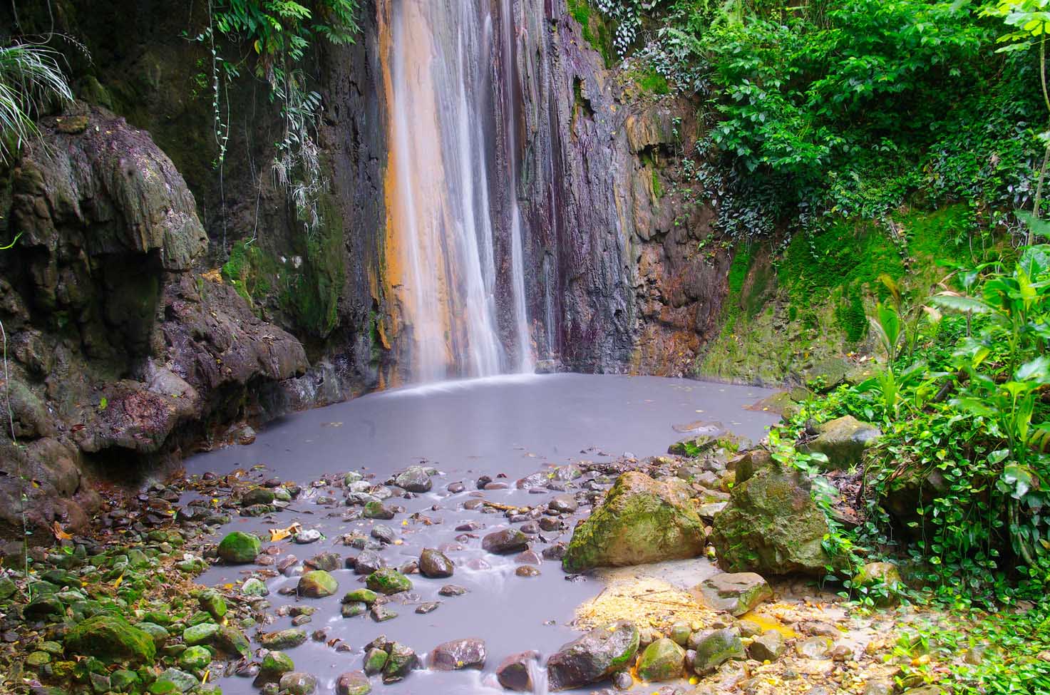 Diamond Falls, St Lucia, with rocks and trees.