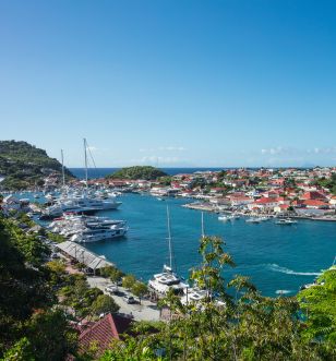 A marina full of ships and houses in St Lucia