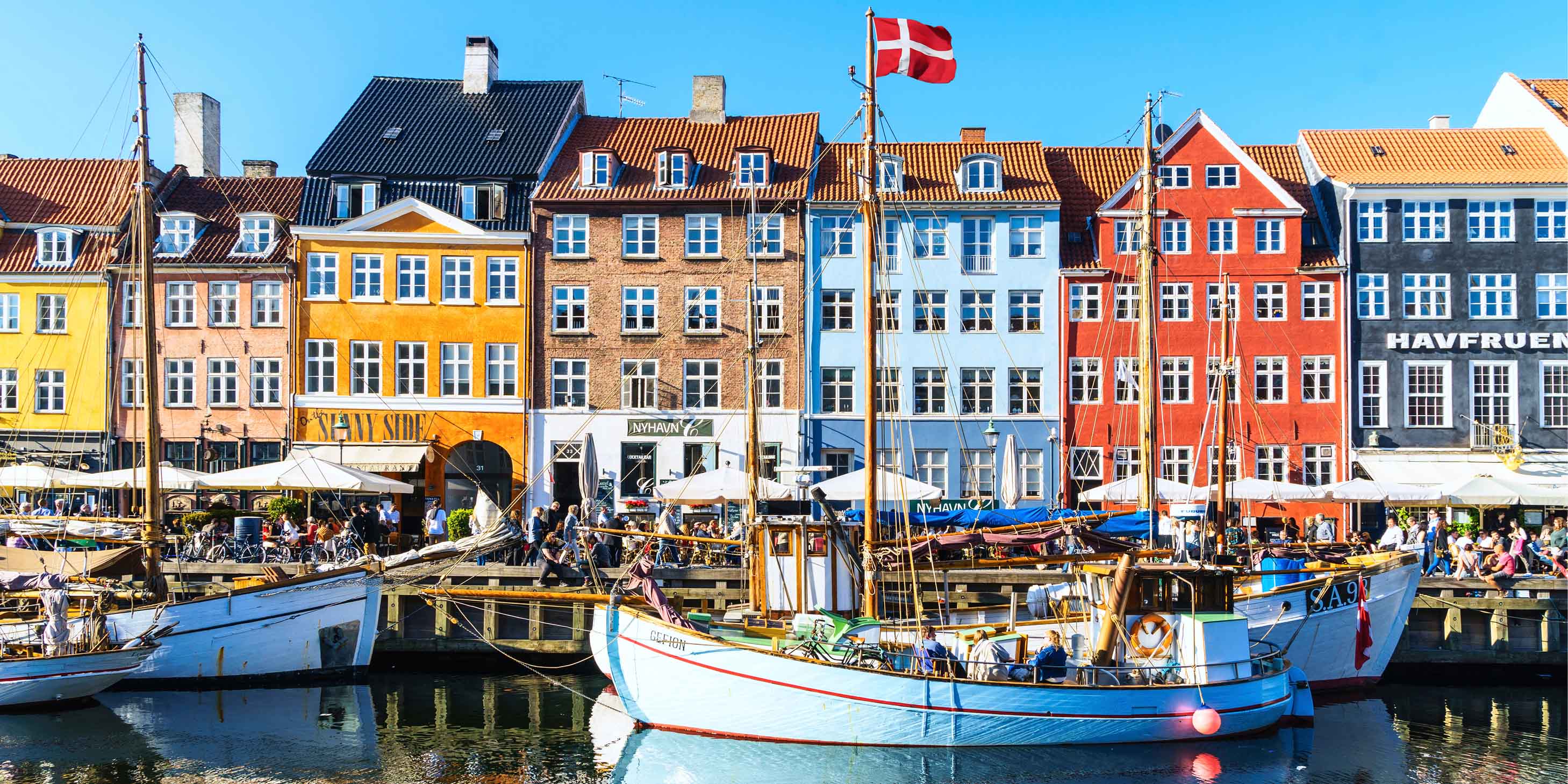 Aerial view of Copenhagen, Denmark with colourful buildings, canals, and boats