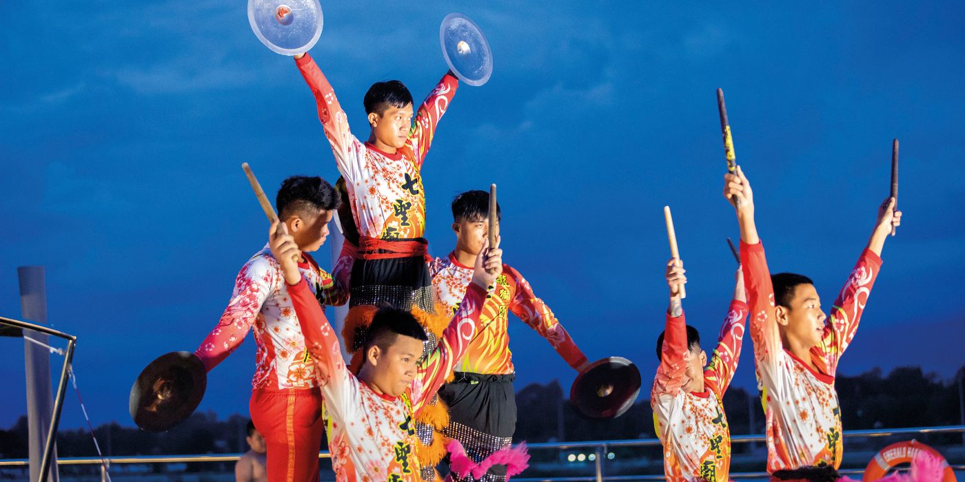 A Lion Dance performance for guests on the Sun Deck of an Emerald Cruises river cruise along the Mekong River