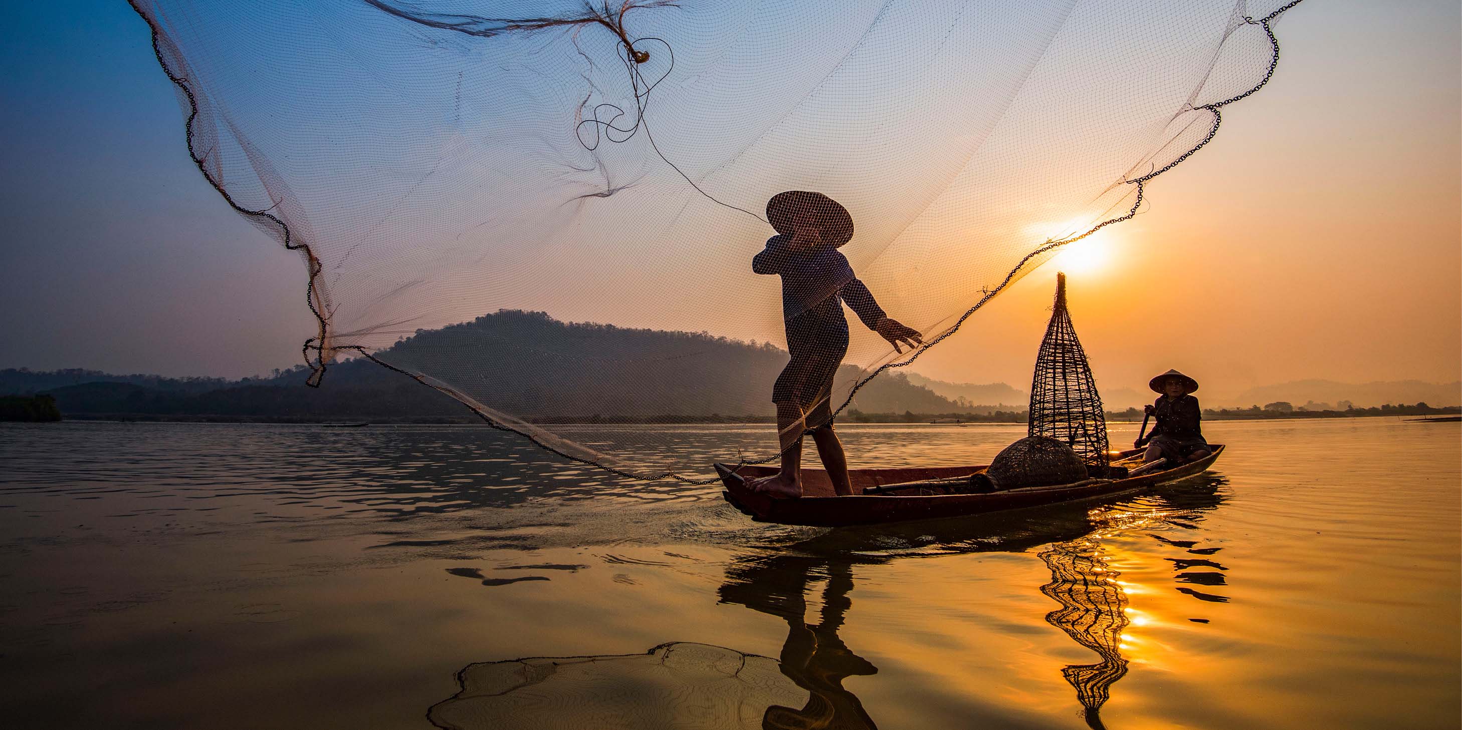 Local fisherman in Southeast Asia at sunrise