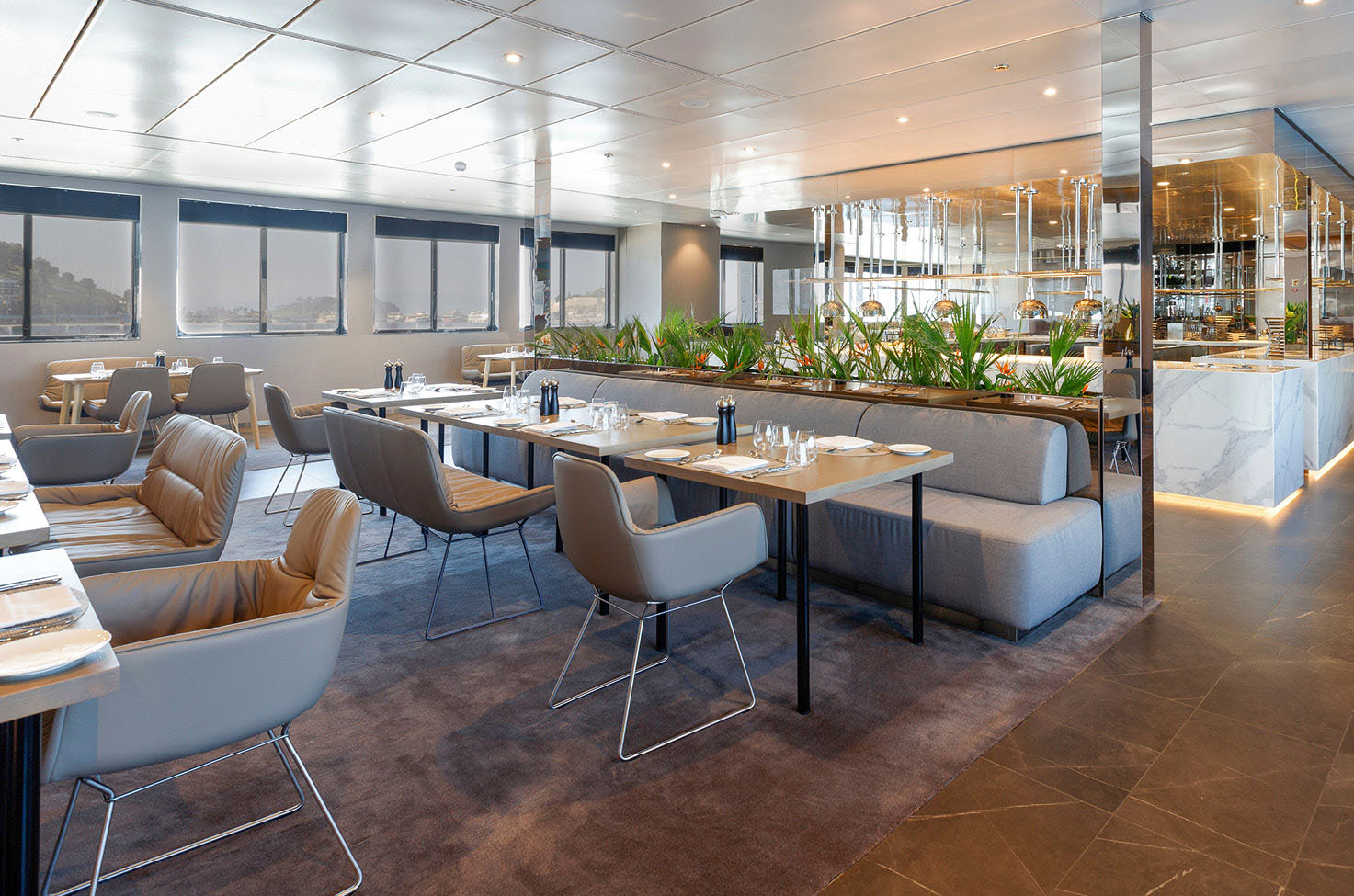 Delicious leg of lamb and seasonal vegetables served on board a luxury yacht