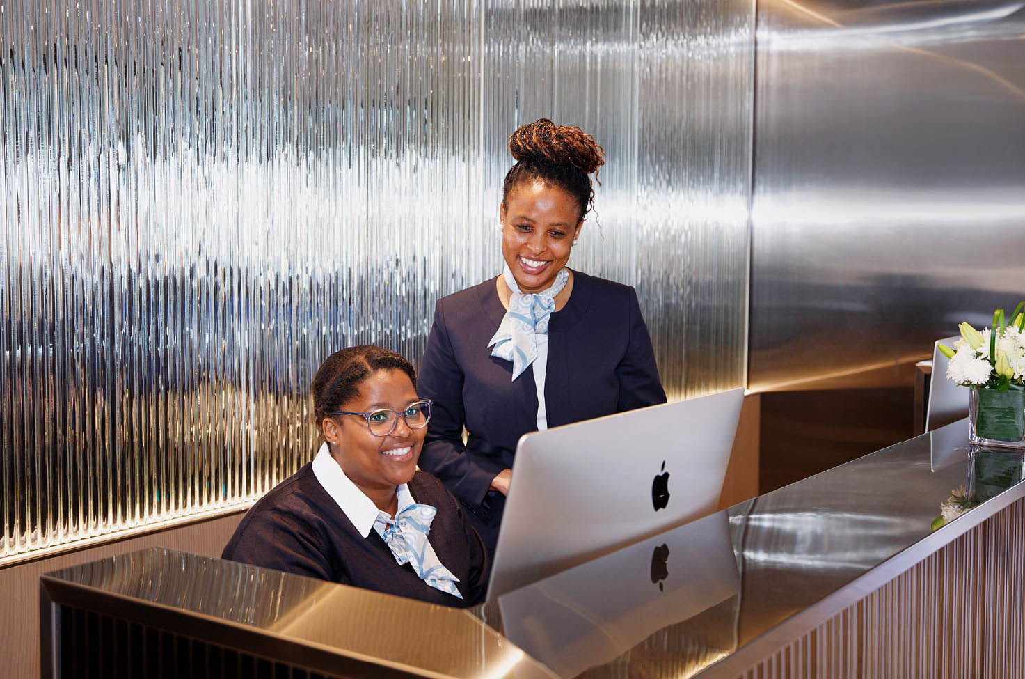 Friendly staff working on board a luxury yacht